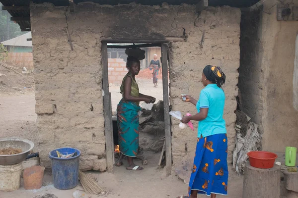 stock image Opialu, Benue State - March 6, 2021: Hardworking African Women engaged in her Activity in her Community