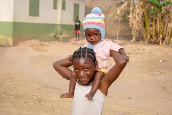 stock image Opialu, Benue State, Nigeria - March 6, 2021: Portrait of cute african kid in the Opialu village, Nigeria