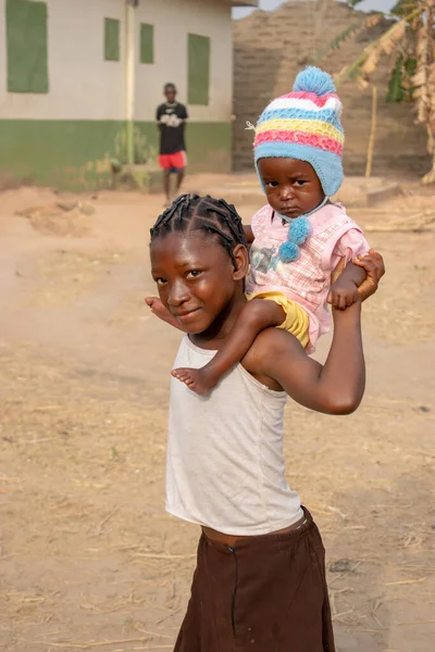 stock image Opialu, Benue State, Nigeria - March 6, 2021: Portrait of cute african kid in the Opialu village, Nigeria