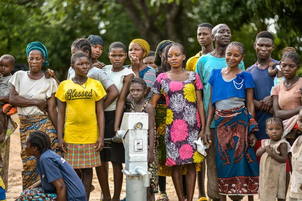 stock image Talata, Plateau State - June, 2023: Community Members standing near Newly Built Indian Hand Pump