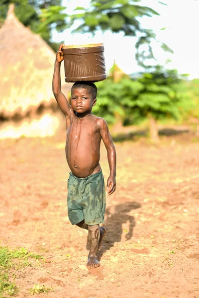 African Children Playing At The Village Water Pump Stock Photo