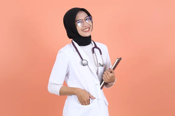 Muslim Asian Female Doctor White Coat Holding Notebook Wearing Glasses Royalty Free Stock Images