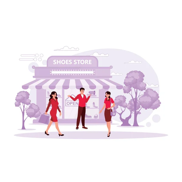 Schuhgeschäft Mit Einem Männlichen Verkäufer Und Zwei Lächelnden Kundinnen Trend — Stockvektor