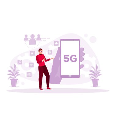 5G ağ kablosuz sistemi olan bir cep telefonu. Bir işadamı cep telefonunu işaret ediyor. Konsept hesaplanabilir. Modern vektör düz resimleme eğilimi