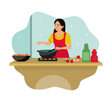 Sağlıklı ve besleyici yiyecekler. Bir kadın mutfakta taze sebzelerle ve malzemelerle besleyici yemekler pişiriyor..