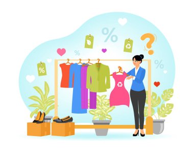 Askıdan kıyafet seçen bir kadın, sürdürülebilir modaya önem veriyor. Çevresel bilinci ve şık alışveriş tercihlerini teşvik eder. Çevre dostu ürünler kavramı.