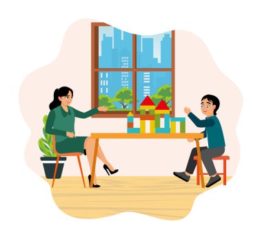 Çocuklar eğitim aktivitesi. Bir anne, çocuğuna oyuncak blokları istifleyerek sosyal beceri eğitimi sağlar..