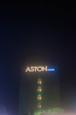 A bright neon sign displaying 