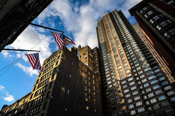 American Flags and Sunlit Skyscrapers on Fifth Avenue - Manhattan, New York City