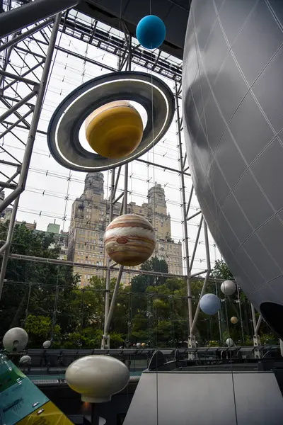 stock image Planet Models beside the Great Sphere in Hayden Planetarium - Natural History Museum, Manhattan, New York City