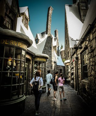 Narrow Alleys of Hogsmeade Village at the Wizarding World of Harry Potter in Universal Studios Hollywood - Los Angeles, California clipart