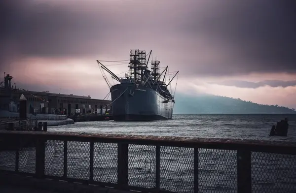 stock image The World War II Ship SS Jeremiah O'Brien seen from Pier 45 under Moody Skies - San Francisco, California