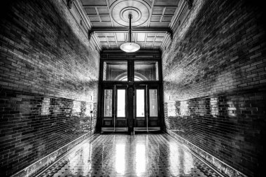 The Entrance Corridor of the Bradbury Building in Monochrome - Downtown Los Angeles, California clipart