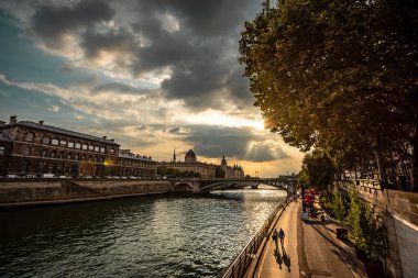 Sunset View of the Seine and Parisian Landmarks from Pont d'Arcole - Paris, France clipart