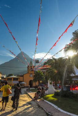 Festive Flags and Tropical Light in Vila do Abraao Square - Ilha Grande, Brazil