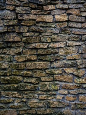 Toprak ve örümcek ağlı yosunlu taş duvar dokusu, arka plan duvar kağıdı dekorasyonu