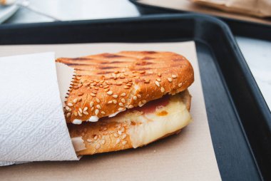 Ham and Cheese Toasted Sandwich with Sesame Bun