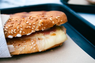Ham and Cheese Toasted Sandwich with Sesame Bun