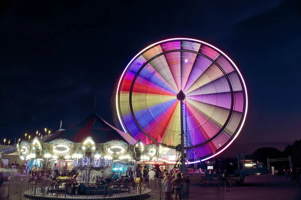 stock image Motion blur at night of the ferris wheel at Creek County Fairgrounds. Located on Route 66 in Sapulpa, Oklahoma