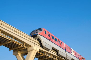train on a monorail road on the Dubai bridge, view from below