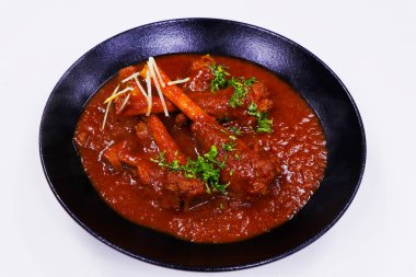 Yavaş pişmiş Hint kuzu inciği köri, namı diğer Nalli Rogan Josh.