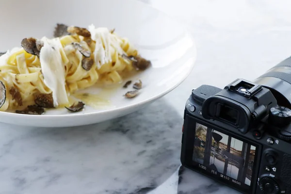 food photography concept, camera and food on a frame