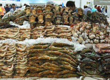 seafood for sell in a market stall clipart