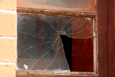 broken window glass and frame with wall clipart