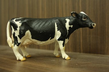 cow figurine on a table