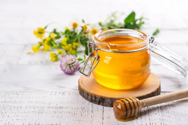Glass Jar Floral Liquid Honey Honey Dipper Copy Space Stock Picture