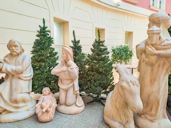 Christmas vertep, scene of birth of Jesus Christ toys. Holiday composition, religious scene with Virgin Mary, baby, Joseph and three wise men. Prague. Czech. High quality photo