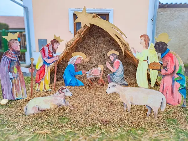 Christmas vertep, scene of birth of Jesus Christ toys. Holiday composition, religious scene with Virgin Mary, baby, Joseph and three wise men. Czech. High quality photo