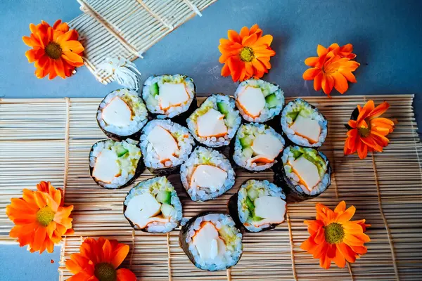 A nice and delicious breakfast for Valentines Day. Japanese sushi - fast food. Asian traditional snack. Preparing healthy snack. Healthy and lean food concept. Sushi menu. High quality photo