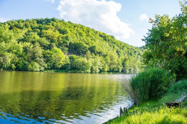 Beautiful views near the Berunka River in spring, forest and mountains. Near Karlstejn. Czech. High quality photo