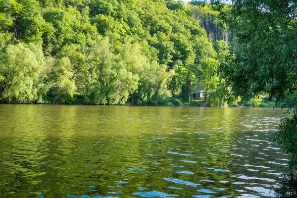 Beautiful views near the Berunka River in spring, forest and mountains. Near Karlstejn. Czech. High quality photo