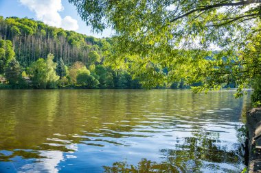 Beautiful views near the Berunka River in spring, forest and mountains. Near Karlstejn. Czech. High quality photo