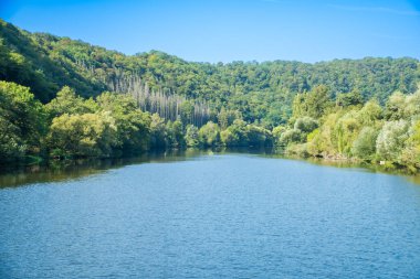 Water landscape with fishermens boats on the river Berunka. autumn time in Czech, Near Karlstejn. High quality photo clipart