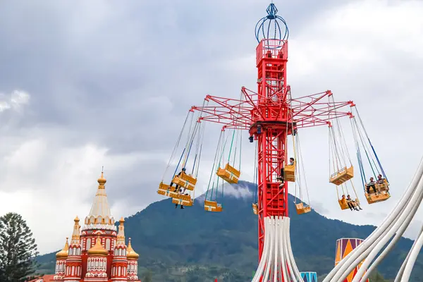 stock image Bandung, Indonesia - July 6, 2024: flying tower rides at the Bandung tourist attraction.