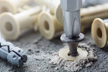 tornavida beton bir arka planda vida ve panel