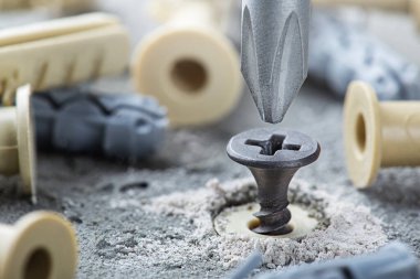 tornavida beton bir arka planda vida ve panel