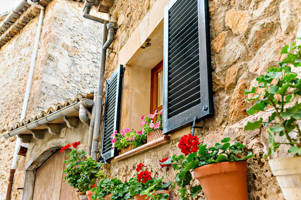 Beautiful views of a street in the picturesque and famous town of Valldemosa, Mallorca, Balearic Islands, Spain