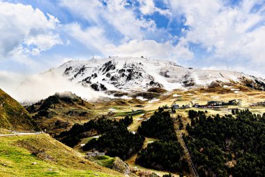 Mountains and ski resort Baqueira Beret in the municipality of Alto Aran, Aran Valley, Lerida. Snow in the Pyrenees clipart