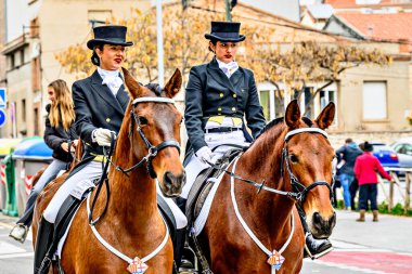 Igualada, Barcelona, Spain; January 19, 2025: Festival of the Three Tombs of Igualada. Tours through the streets of the city on the 203rd anniversary of the ancient guild of Traginers of Igualada.  clipart