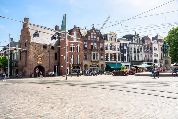 stock image The Hague, Netherlands - June 17, 2022: Traditional Buildings line De Plaats, one of the smaller squares in The Hague. Located opposite the Hofvijver lake, it is a mixture of restaurants, lunchrooms and shops.