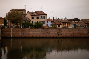 Discover the iconic Ponte di Tiberio, a Roman bridge spanning the River Marecchia in Rimini, Italy. Built in 20 AD, this majestic structure is a testament to Roman engineering and a must-see clipart