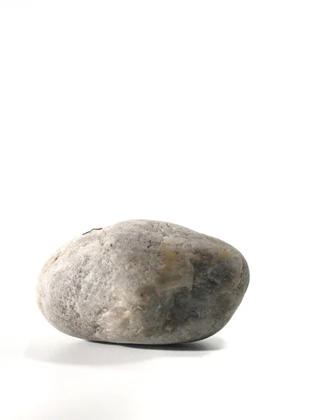 白い背景上に分離されて灰色の石 — ストック写真
