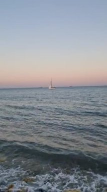 Yacht in the tropical sea at sunset . High quality footage