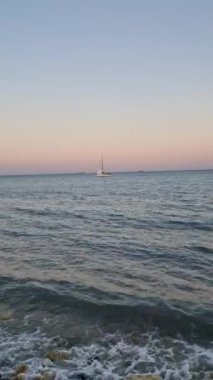 Yacht in the tropical sea at sunset . High quality footage