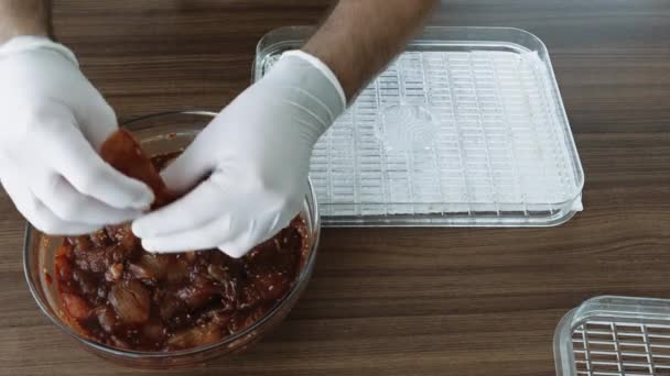 Mens Hands Gloves Cooking Chiken Slices Being Smoked While Dehydrating — Stock Video
