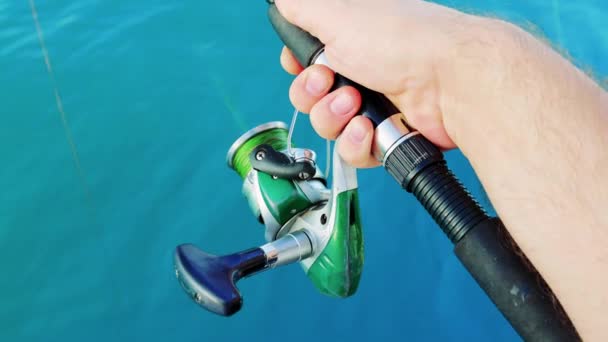 Reel Fishing Rod Hand Rotation Orange Sunset Slow Motion High — Stock Video